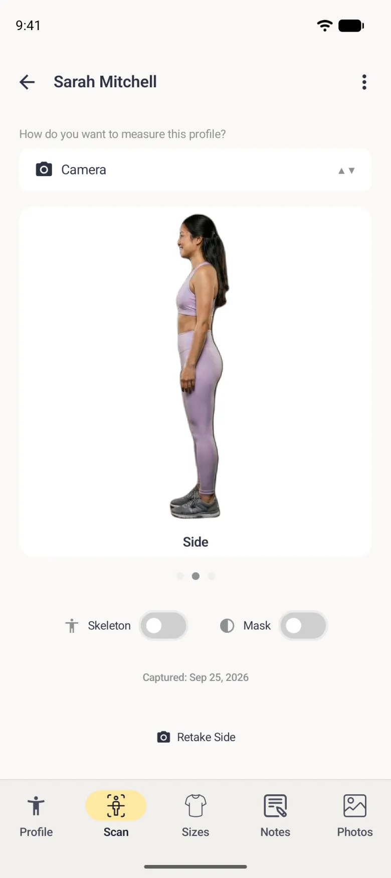 A Scan tab showing the side-view photo of the scan labelled Side, with the middle of three page dots filled in and the link below renamed Retake Side.