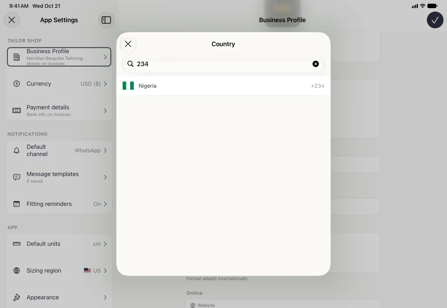Country card centred over the dimmed App Settings split view, with a close button at the top left, 234 typed into the search field with its clear button, and a single result, Nigeria with its flag and the code +234; the keyboard has been put away.