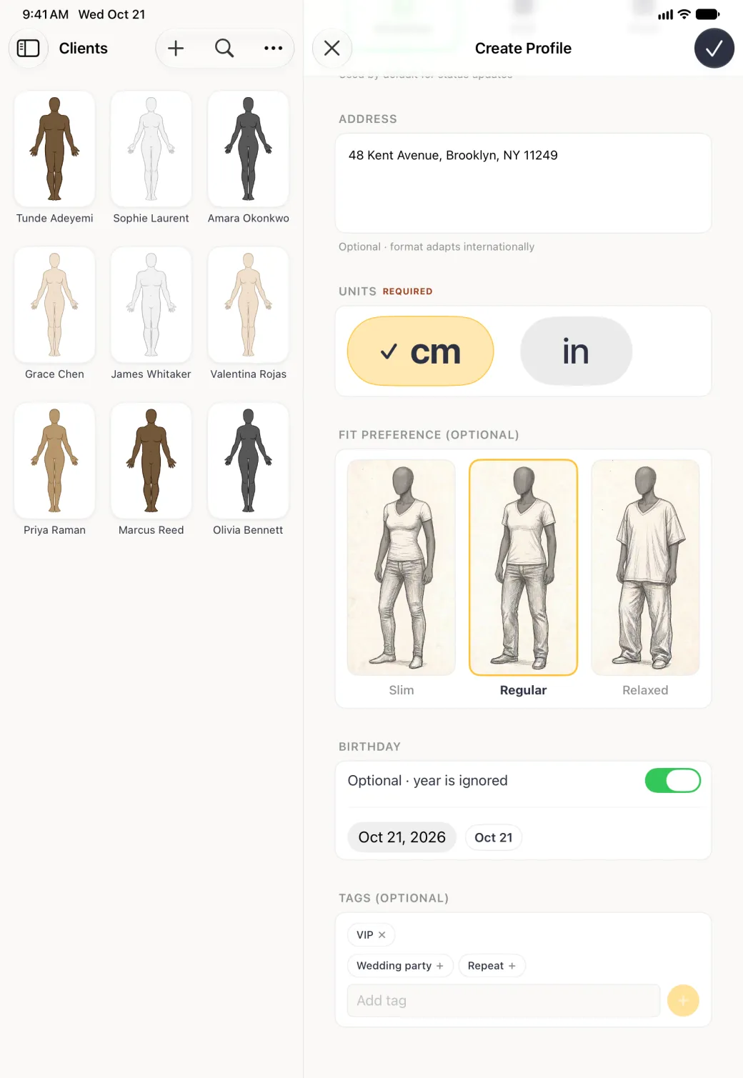 Lower part of the Create Profile form beside the Clients grid, with the address 48 Kent Avenue, Brooklyn, NY 11249, the UNITS card with cm ticked, the FIT PREFERENCE (OPTIONAL) card with three sketched figures and Regular outlined in gold, the Birthday switch on in green above an Oct 21, 2026 date button and an Oct 21 chip, and under TAGS (OPTIONAL) an applied VIP tag with a cross, suggestions Wedding party and Repeat, and an Add tag field.