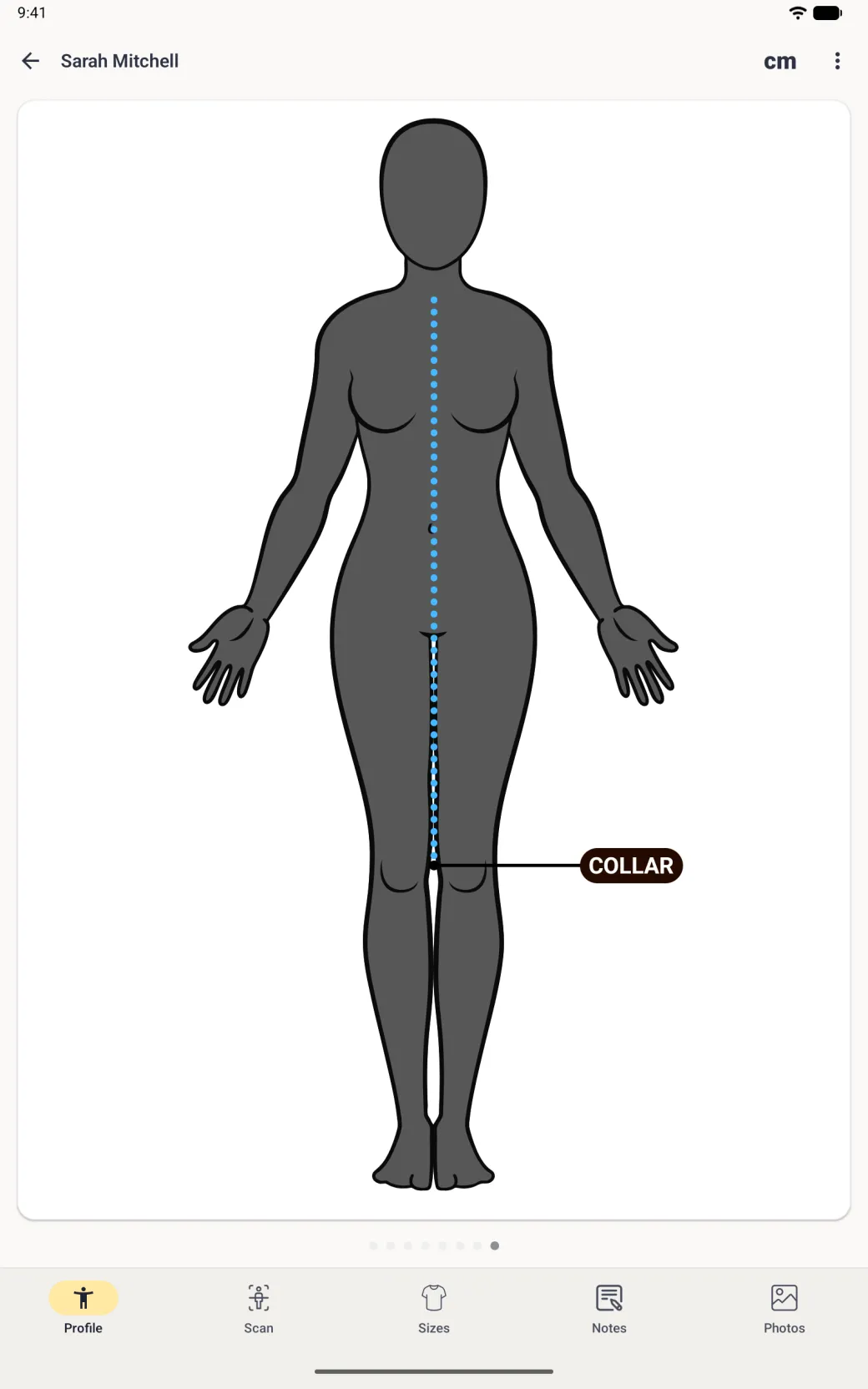 The client page showing the charcoal figure with a blue dotted line from the base of the neck down the front to the knees and a dark label pill reading COLLAR to the right of the knee, joined to the end of the line by a leader line.