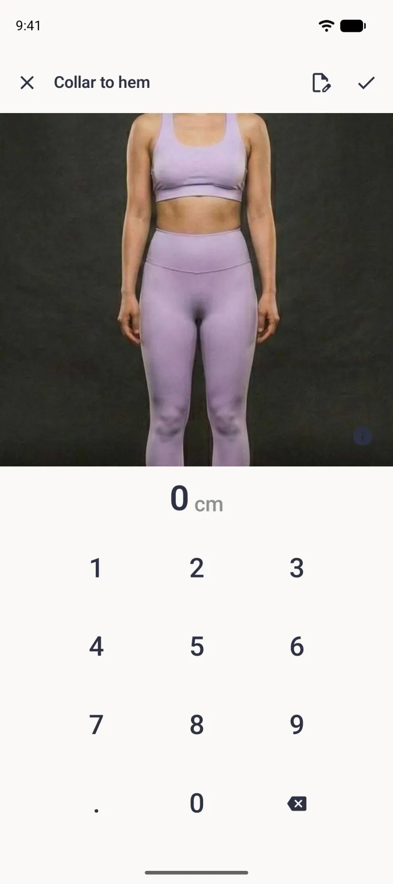 An entry screen titled Collar to hem showing a reference photo, a navy information button, the value 0 cm and the number pad, with an edit button and a checkmark in the top bar.