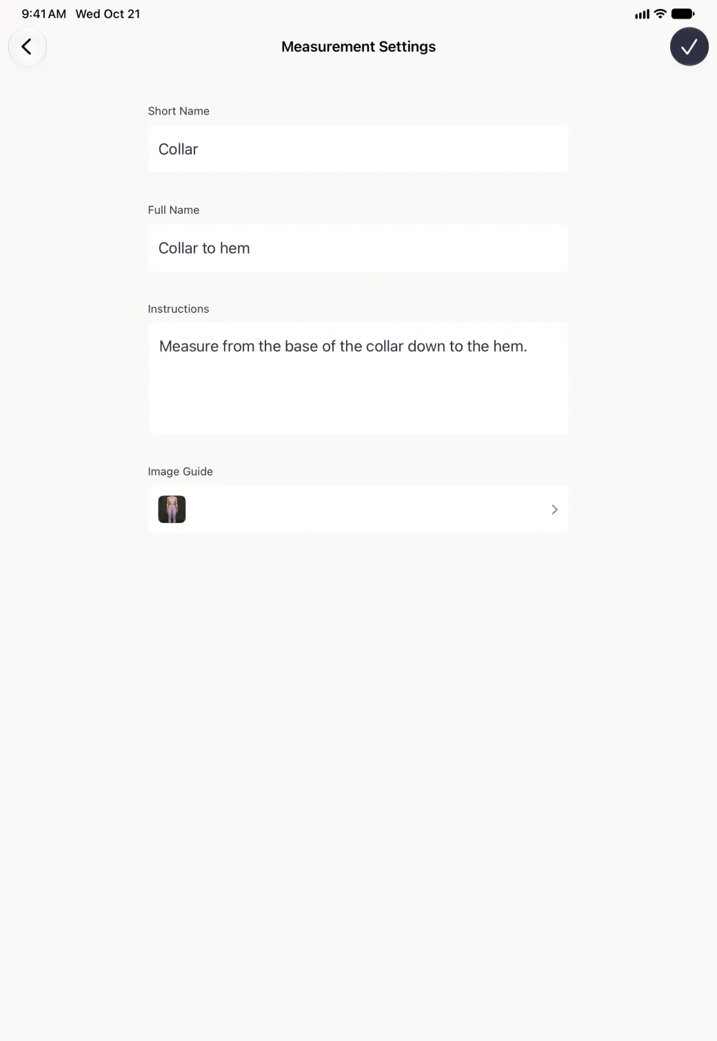 The Measurement Settings page on the iPad with a small photo thumbnail now sitting at the left of the Image Guide row, under the names Collar and Collar to hem and the instructions, and the navy checkmark at the top right.