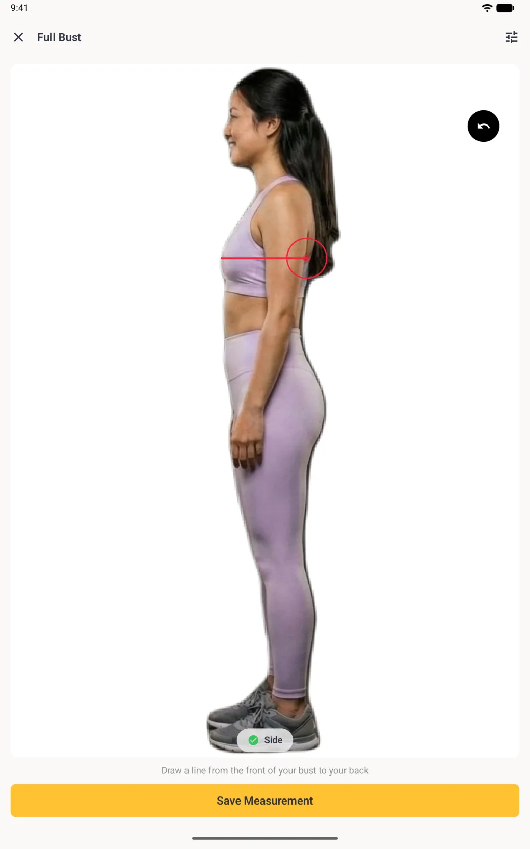 A side profile scan photo of the woman facing left, with a horizontal red line drawn from the front of her bust through to her back and a red target circle at the back, the Side pill with a green tick, and the instruction Draw a line from the front of your bust to your back.
