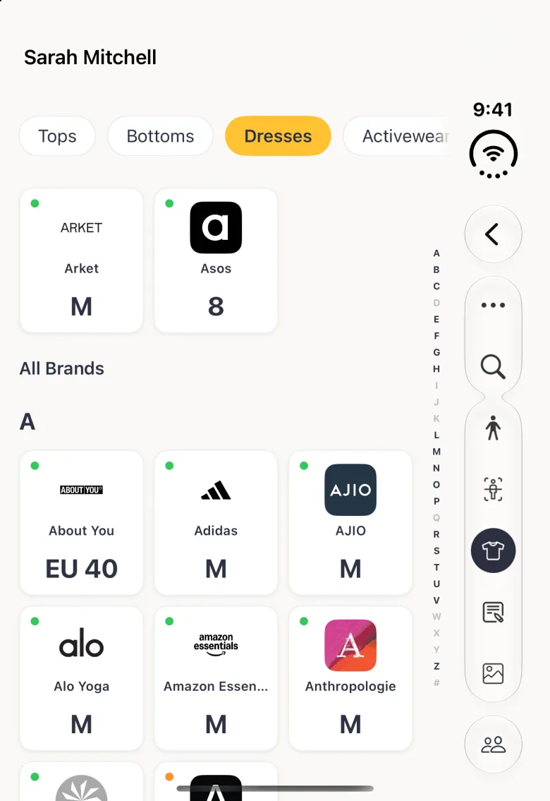 Sizes section on the closed Duo in grid layout sorted A to Z: two favourite cards for Arket M and Asos 8 under the Dresses chip, then All Brands under the heading A with About You EU 40, Adidas M, AJIO M, Alo Yoga M, Amazon Essentials M and Anthropologie M, and an alphabet index running down between the grid and the vertical bar strip on the right.