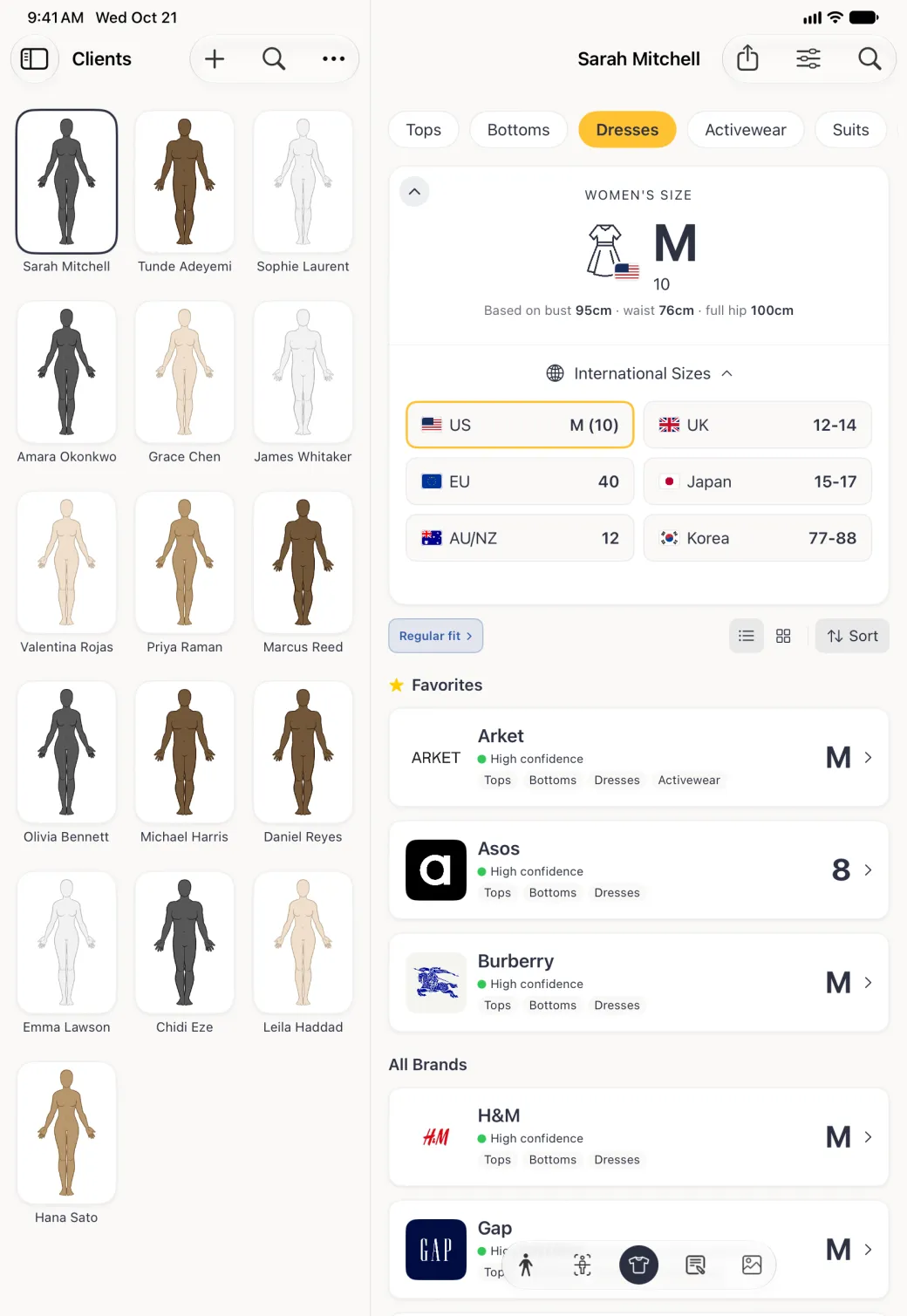 The Dresses size card in Sarah Mitchell's Sizes section, beside the Clients grid, expanded to list International Sizes in two columns of flag tiles: US M (10) outlined in gold, UK 12-14, EU 40, Japan 15-17, AU/NZ 12 and Korea 77-88, above the fit pill, the list and grid buttons and the favourite brands.