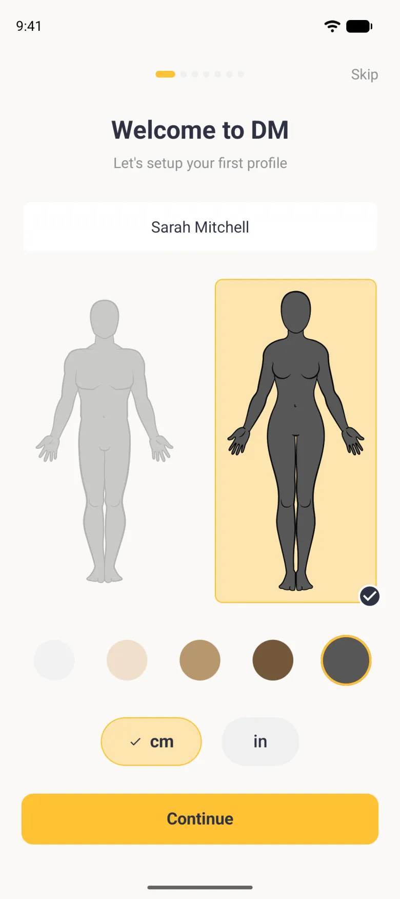 Welcome screen under seven page dots with the woman outline filled charcoal on a gold card, the man outline in light grey, the charcoal skin tone ringed in gold, cm ticked in a gold pill, and a gold Continue button at the bottom.