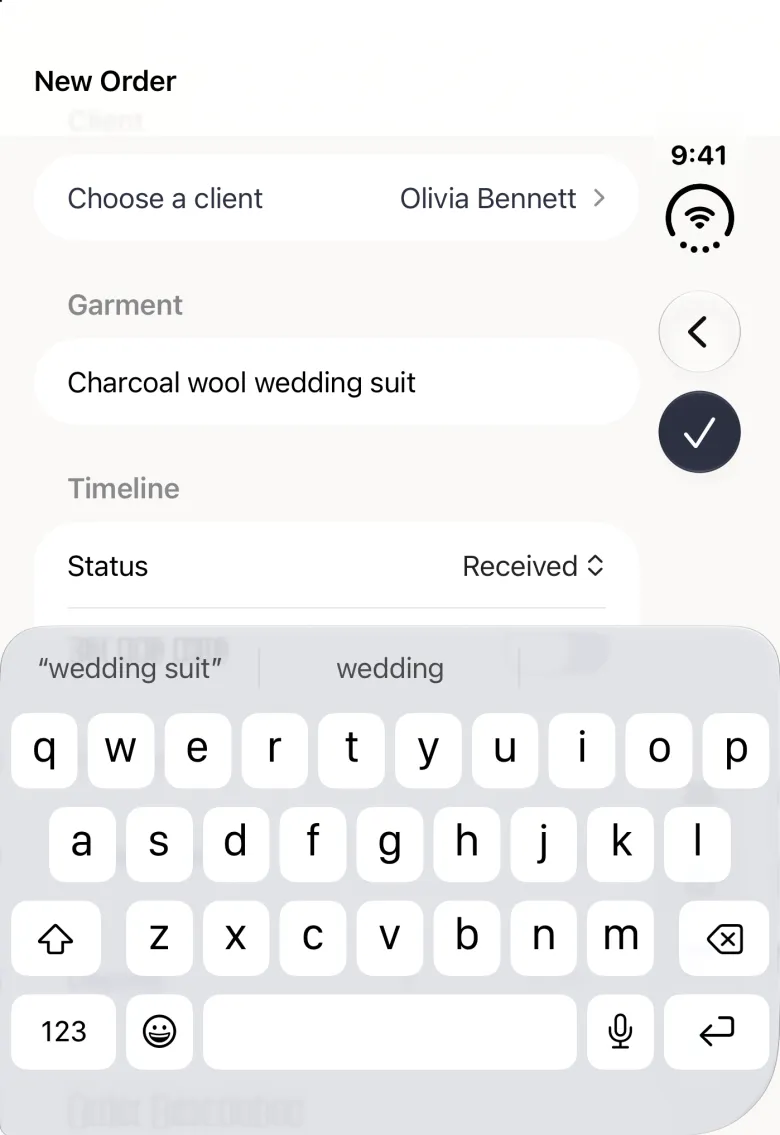New Order screen on the closed iPhone Duo with Olivia Bennett on the Choose a client row, Charcoal wool wedding suit typed in the Garment field and the Status row reading Received, the keyboard open over the lower half, and in the vertical bar strip on the right edge a back button above the round tick button, now solid navy.