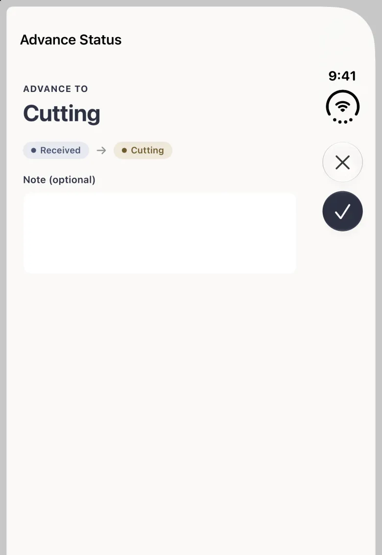Advance Status sheet on the closed iPhone Duo with a close button and a round navy tick button stacked in the vertical bar strip on the right edge, headed Advance To Cutting, with a Received chip, an arrow and a Cutting chip, and an empty Note (optional) box.