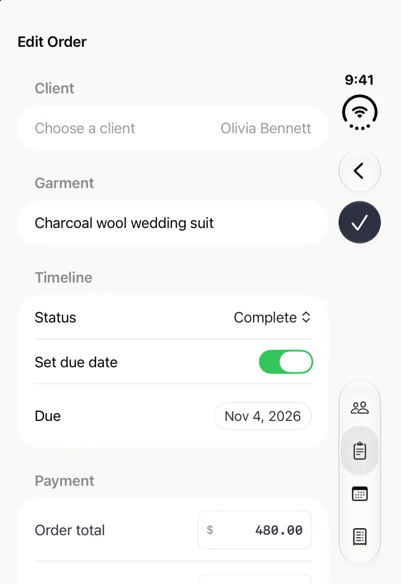 Edit Order form on the closed iPhone Duo with a back button and a round navy tick stacked in the vertical bar strip on the right edge and the four tab buttons lower down the strip: a greyed-out client row reading Olivia Bennett, the garment Charcoal wool wedding suit, Status set to Complete, the Set due date switch on with Due Nov 4, 2026, and an order total of 480.00 at the bottom edge.