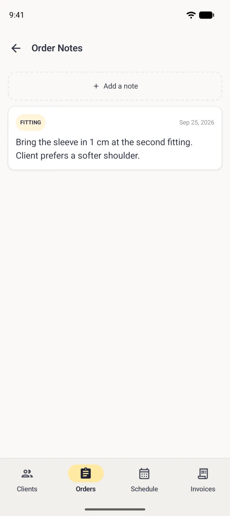 Order Notes screen with the dashed Add a note button at the top and one saved note below it, tagged Fitting and dated Sep 25, 2026, reading Bring the sleeve in 1 cm at the second fitting. Client prefers a softer shoulder.