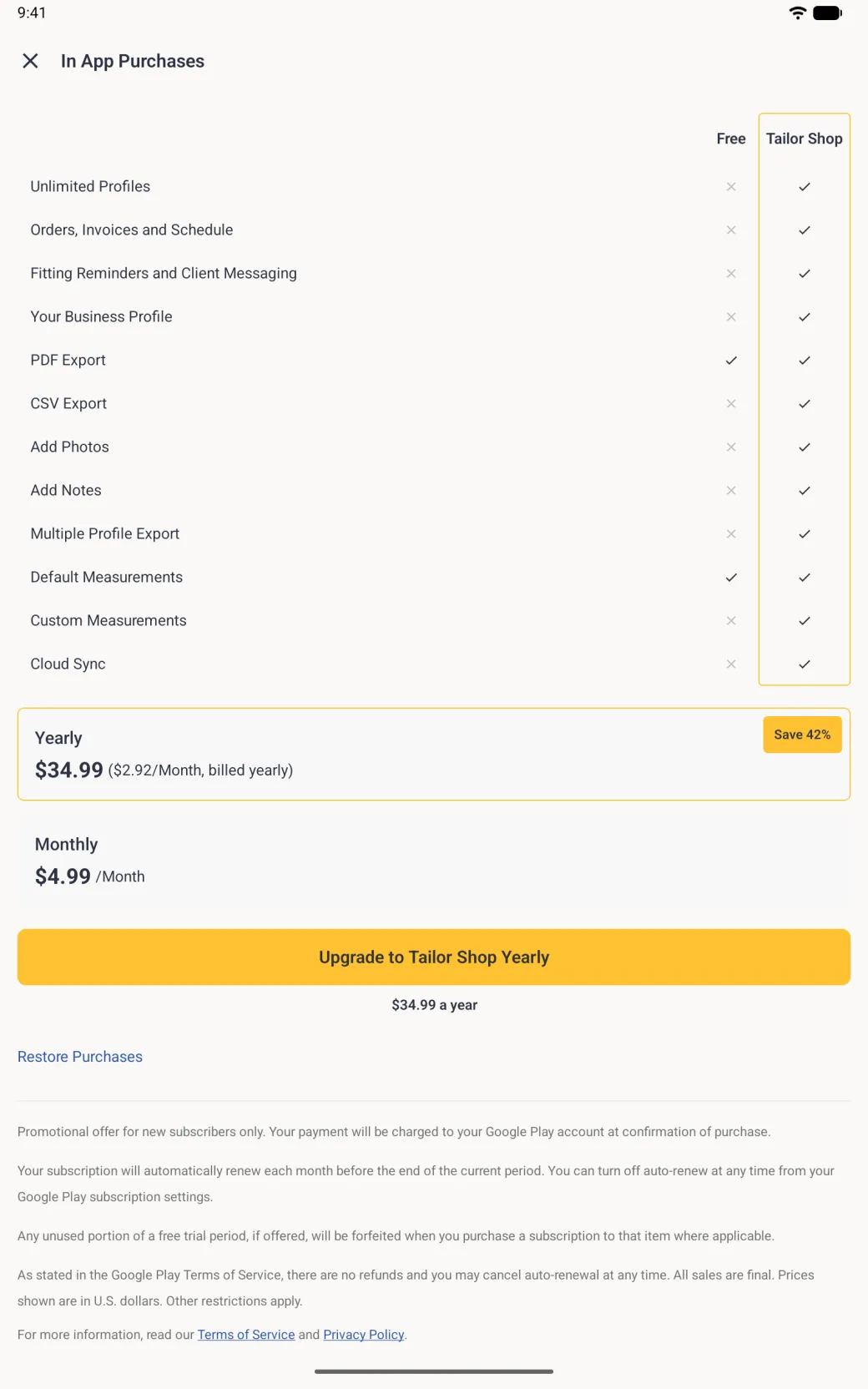 In App Purchases screen on a tablet with a wide Free and Tailor Shop comparison table (Unlimited Profiles; Orders, Invoices and Schedule; Fitting Reminders and Client Messaging; Your Business Profile; PDF Export; CSV Export; Add Photos; Add Notes; Multiple Profile Export; Default Measurements; Custom Measurements; Cloud Sync), the Tailor Shop column outlined in gold, a Yearly card with a Save 42% badge outlined in gold, a Monthly card, each showing its Google Play price, a gold Upgrade to Tailor Shop Yearly button with the yearly price under it, a Restore Purchases link and the Google Play subscription terms.