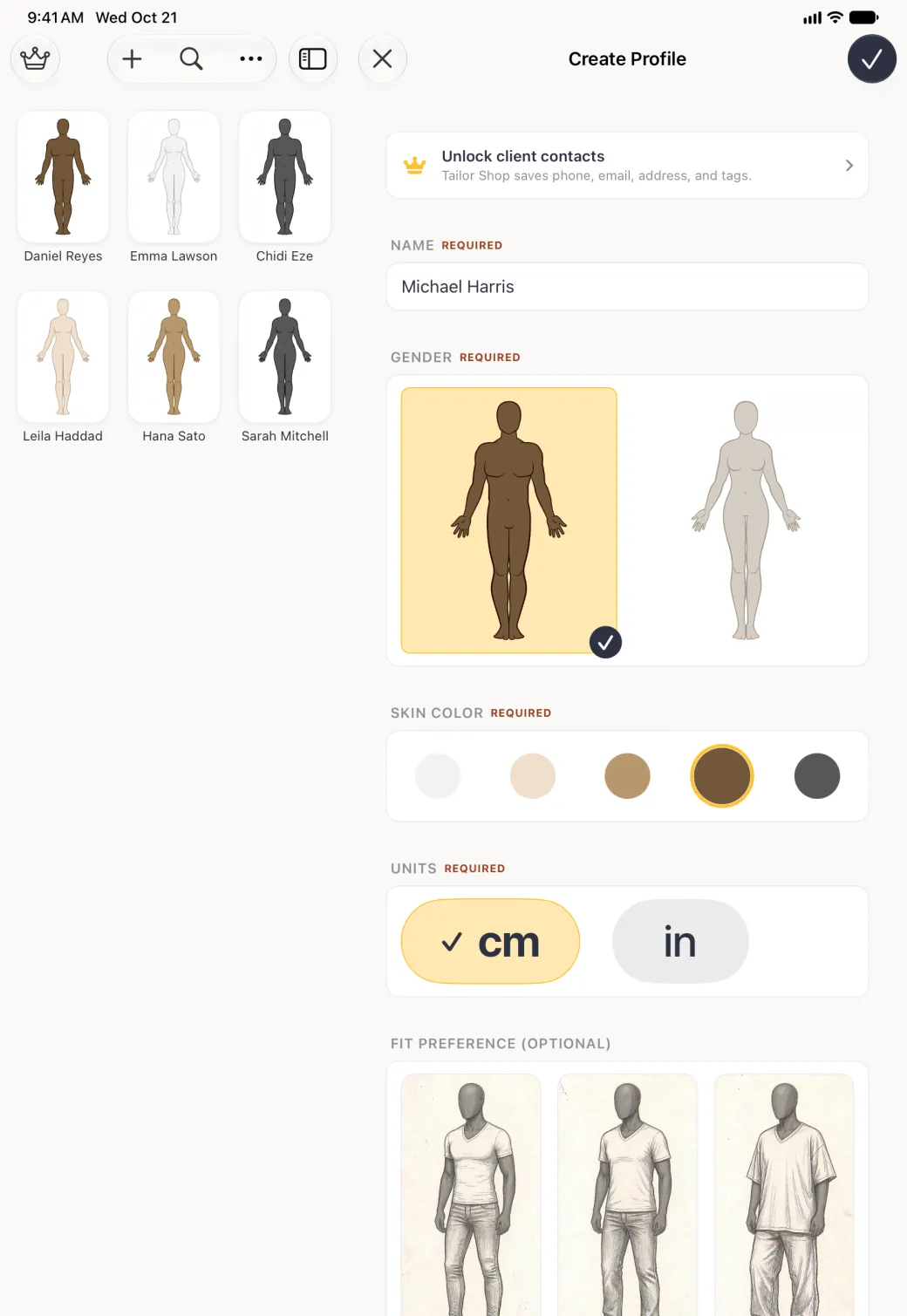 Create Profile form on the right of the split view with the man outline in a brown skin tone highlighted in gold with a navy tick, the woman outline in a pale neutral beside it, the brown circle ringed in gold inside the Skin Color card, and cm ticked in a gold pill inside the Units card, with the Fit Preference sketches starting below and the profile grid on the left.
