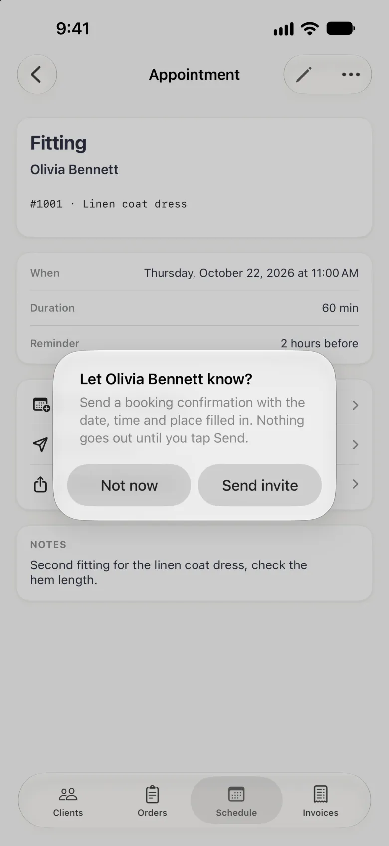 Alert over the new Appointment page reading Let Olivia Bennett know? with the line Send a booking confirmation with the date, time and place filled in. Nothing goes out until you tap Send, and two buttons, Not now and Send invite. Behind it the page shows Fitting, Olivia Bennett, order 1001, Linen coat dress and the When, Duration and Reminder card.