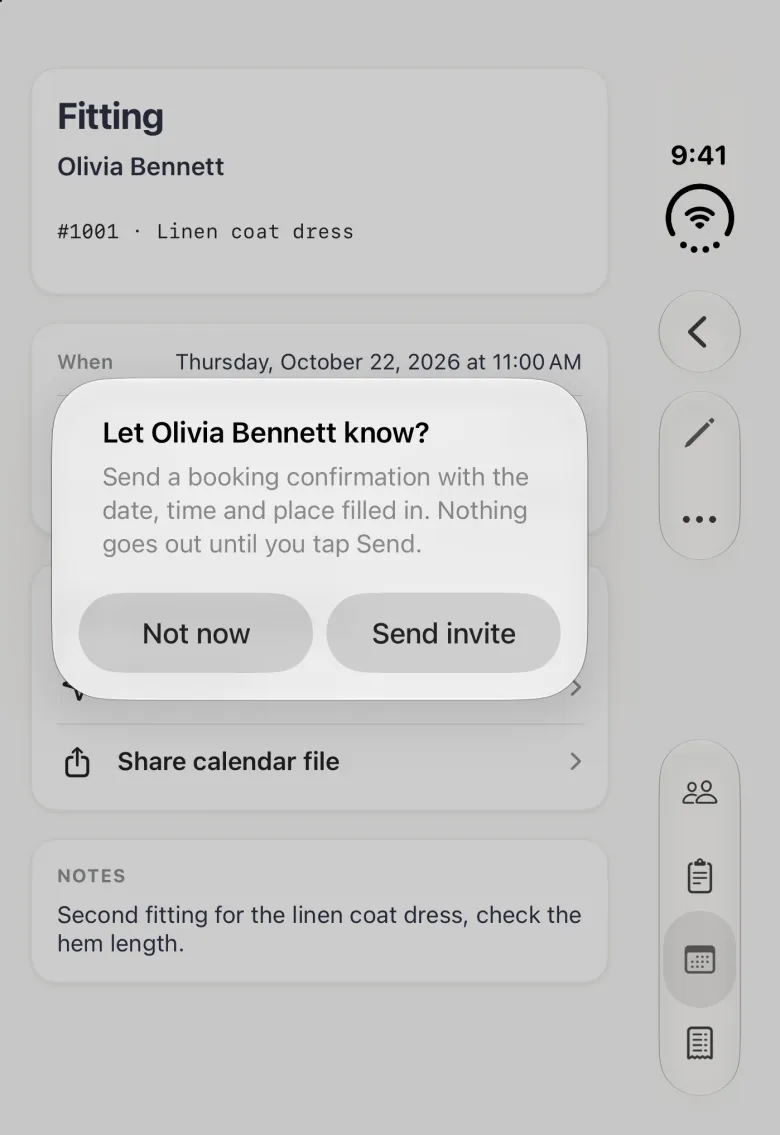 Alert over the new Appointment page on the closed iPhone Duo reading Let Olivia Bennett know? with the line Send a booking confirmation with the date, time and place filled in. Nothing goes out until you tap Send, and two buttons side by side, Not now and Send invite. Behind it the dimmed page shows Fitting, Olivia Bennett, order 1001, Linen coat dress, the When row, the Share calendar file row and the note, with the back, pencil and three-dot buttons in the vertical bar strip on the right edge.