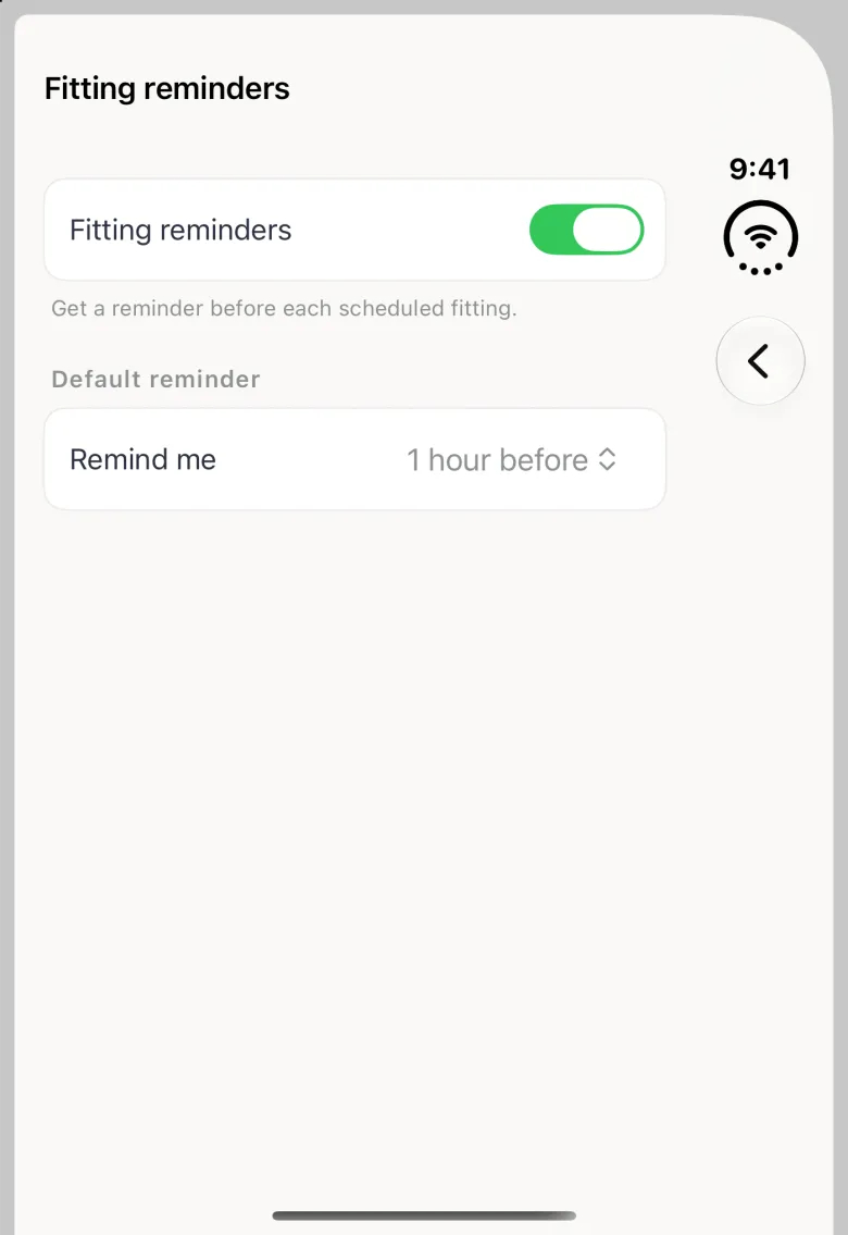 Fitting reminders page on the closed Duo with the title at the top left and a back button in the vertical bar strip on the right, the Fitting reminders switch on in green with the note Get a reminder before each scheduled fitting, and Remind me set to 1 hour before under Default reminder.