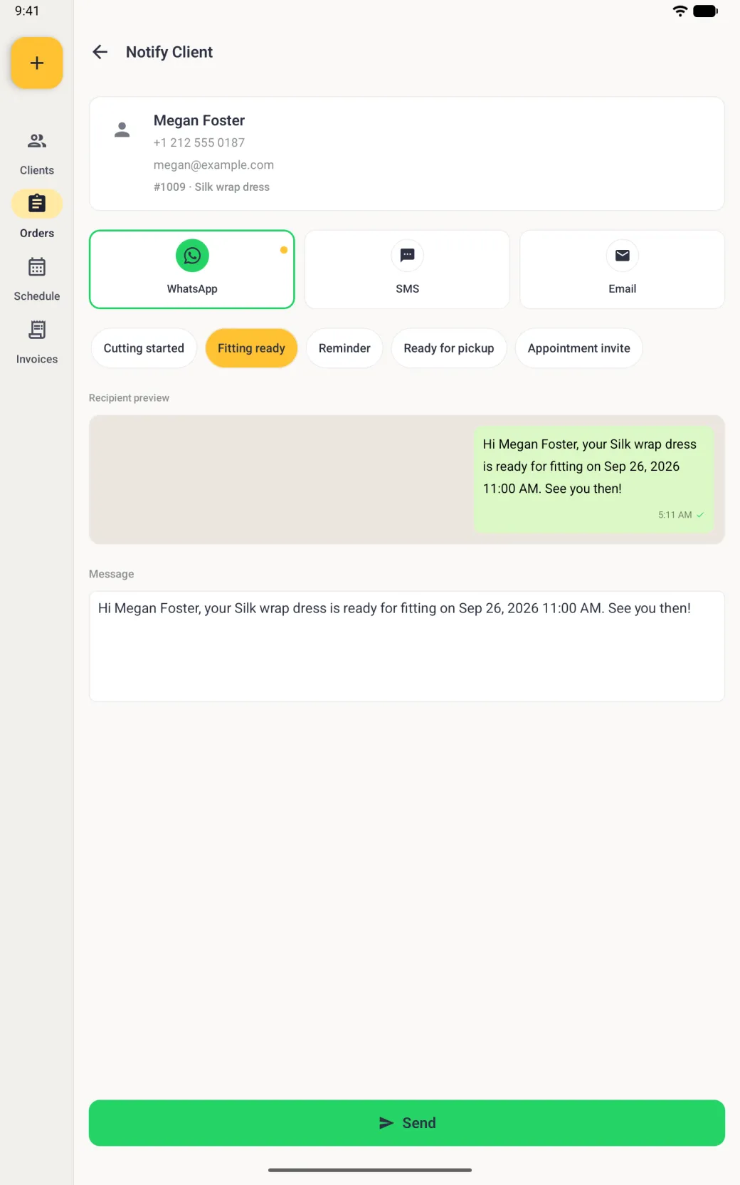 Notify Client screen on a tablet in portrait with a card for Megan Foster showing her phone, email and order 1009 Silk wrap dress, the WhatsApp tile outlined in green with a gold preferred dot beside SMS and Email, a row of five template chips with Fitting ready highlighted in gold, a WhatsApp style preview bubble and a Message box both reading Hi Megan Foster, your Silk wrap dress is ready for fitting on tomorrow's date at 11:00 AM. See you then!, and a wide green Send button at the bottom.