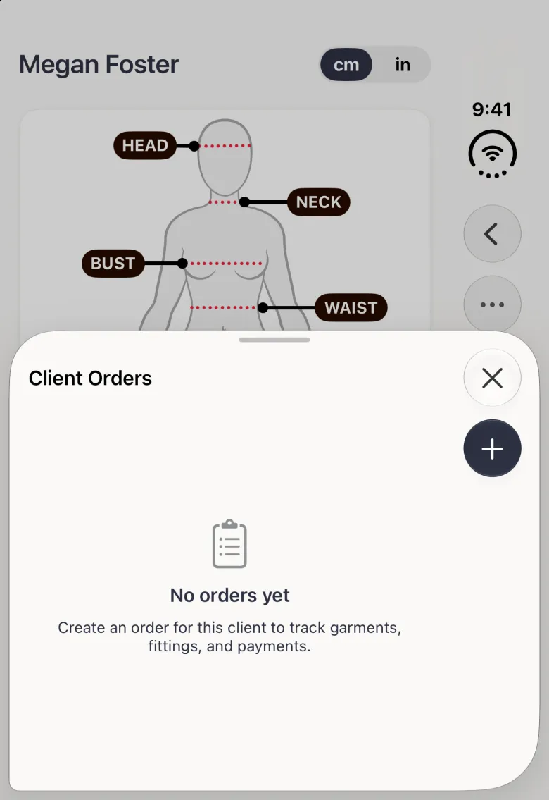 Megan Foster's profile on the closed iPhone Duo dimmed behind a sheet over the lower part of the screen titled Client Orders, with a round X and a navy round plus button stacked at its right, a clipboard icon, No orders yet, and the line Create an order for this client to track garments, fittings, and payments. Above the sheet her name, the cm and in switch and the white-toned avatar show, with Back and the more button in the vertical bar strip on the right edge.